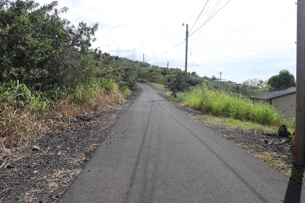 2 Lehua Road Captain Cook, HI 96704 - Photo 6 of 11 a view of a road with a yard