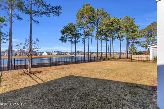 $765,000 | 238 Spicer Lake Drive, Holly Ridge, NC 28445