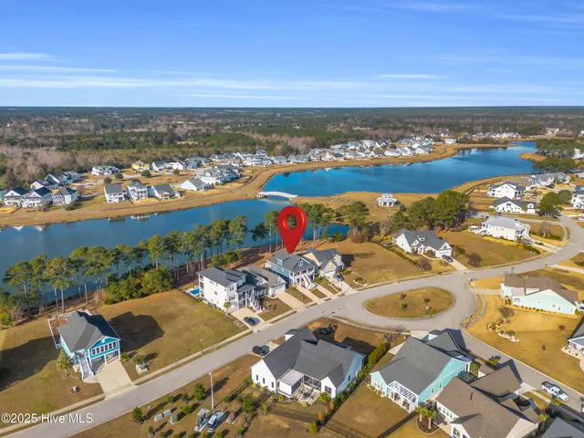 $765,000 | 238 Spicer Lake Drive, Holly Ridge, NC 28445