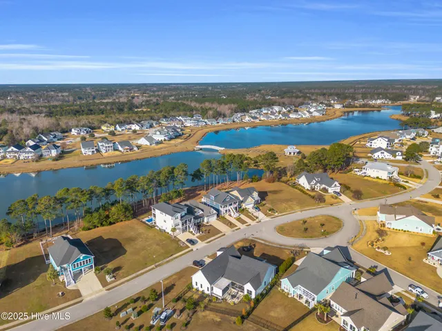 $765,000 | 238 Spicer Lake Drive, Holly Ridge, NC 28445