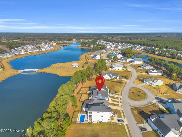 $765,000 | 238 Spicer Lake Drive, Holly Ridge, NC 28445