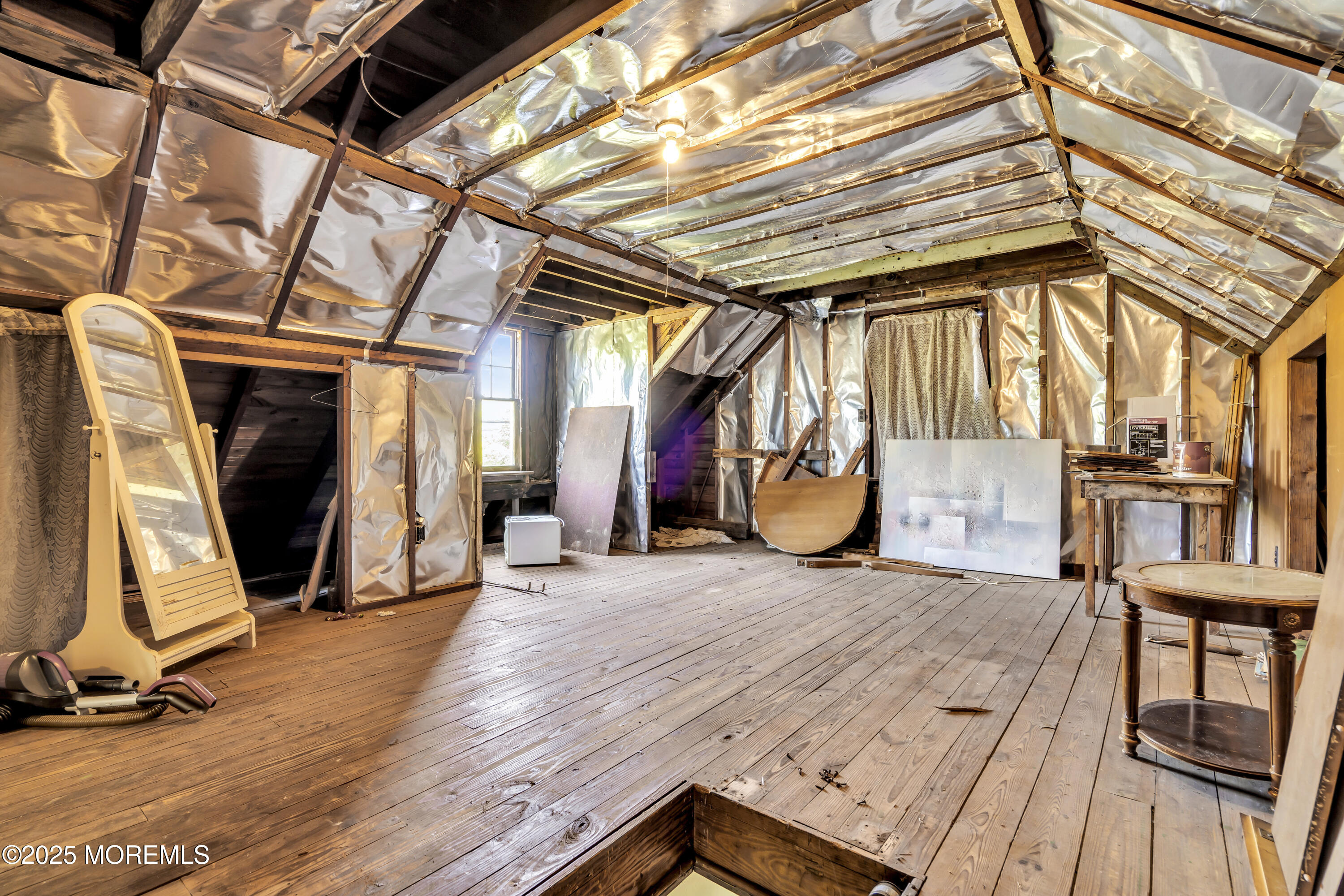 189 Mantoloking Road Brick, NJ 08723 - Photo 20 of 38 a view of a room with wooden floor and furniture