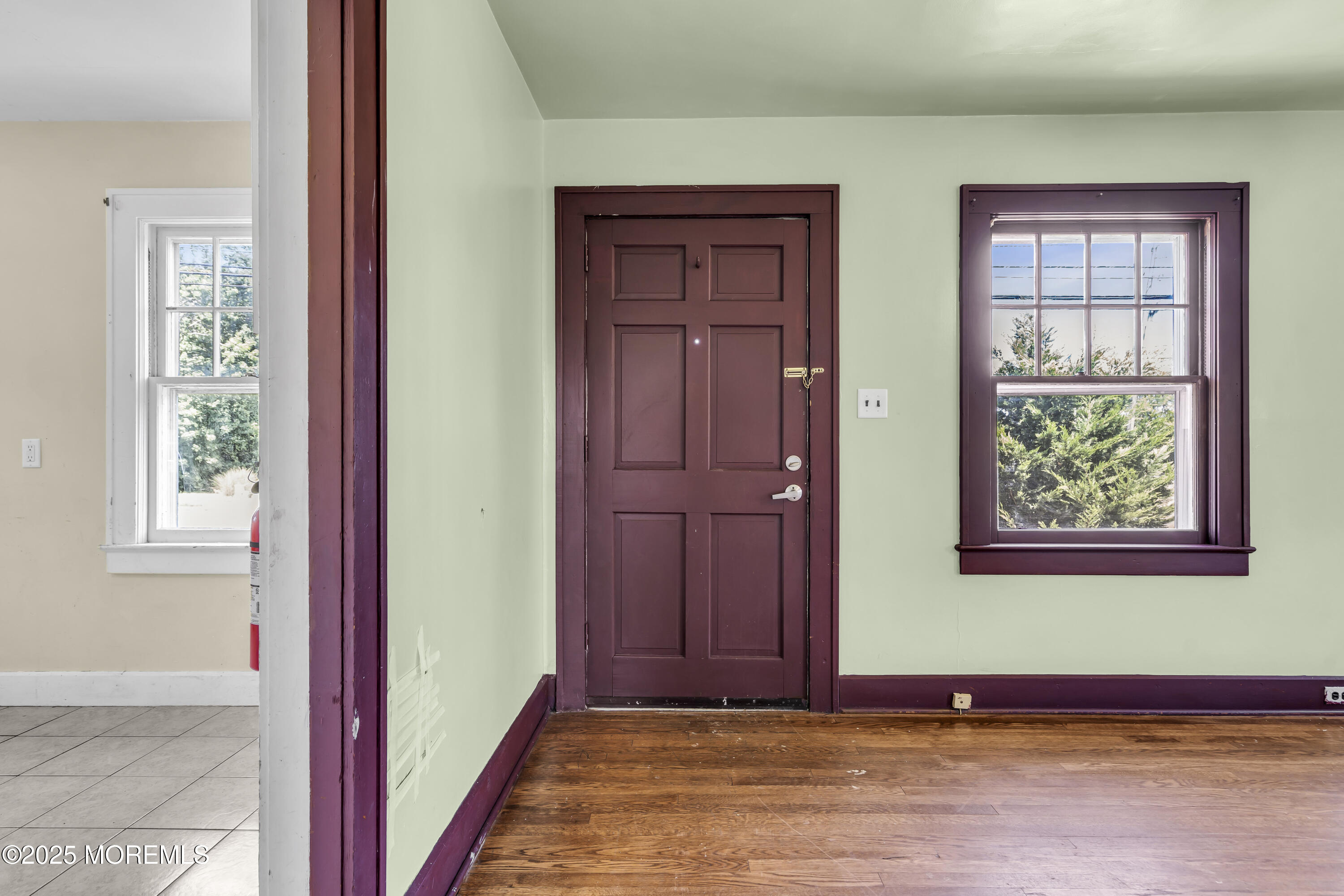 189 Mantoloking Road Brick, NJ 08723 - Photo 5 of 38 an empty room with windows closet and chandelier fan