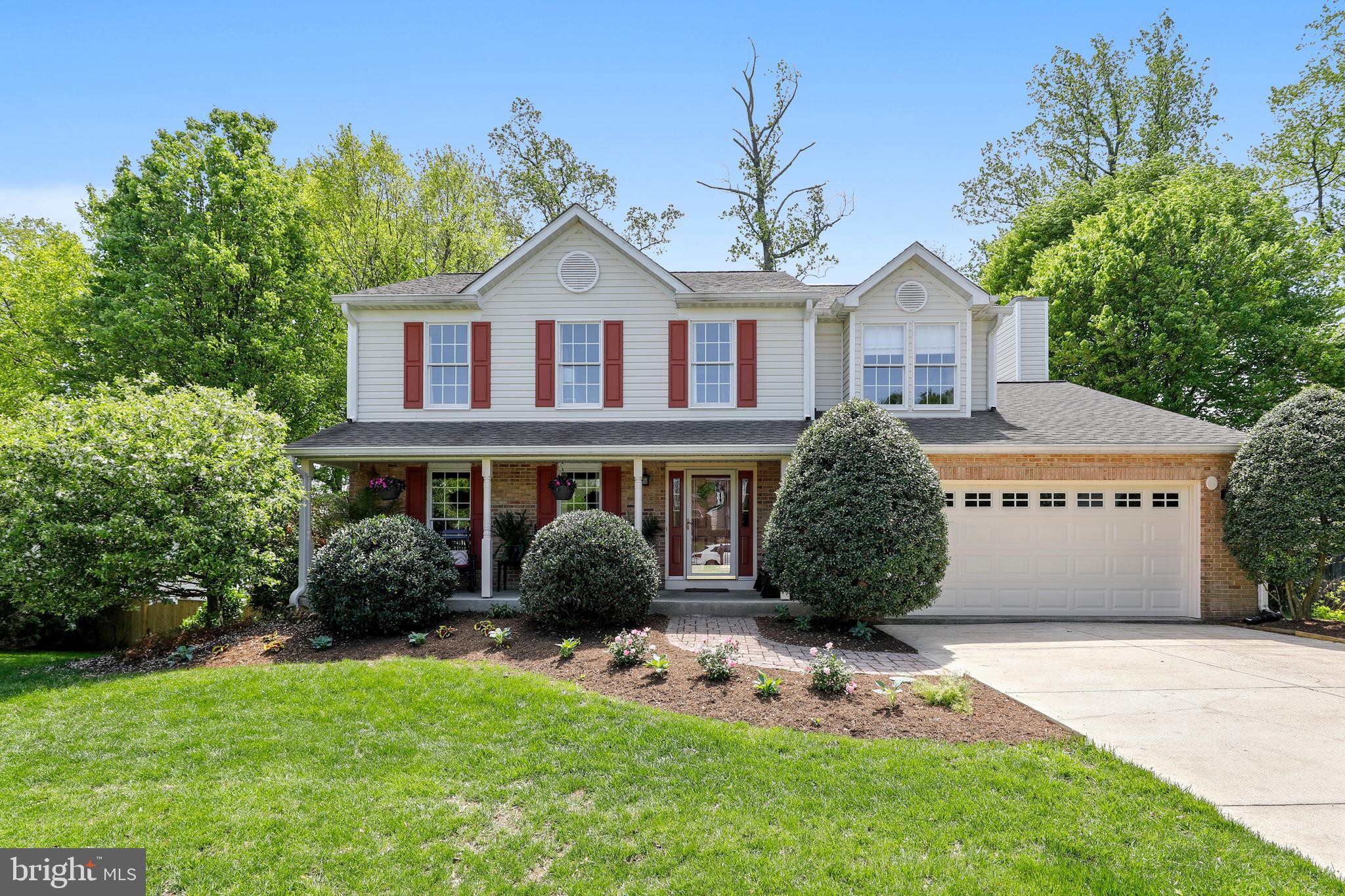 Lovely Colonial on quiet Ct in Courts of 4 Seasons
