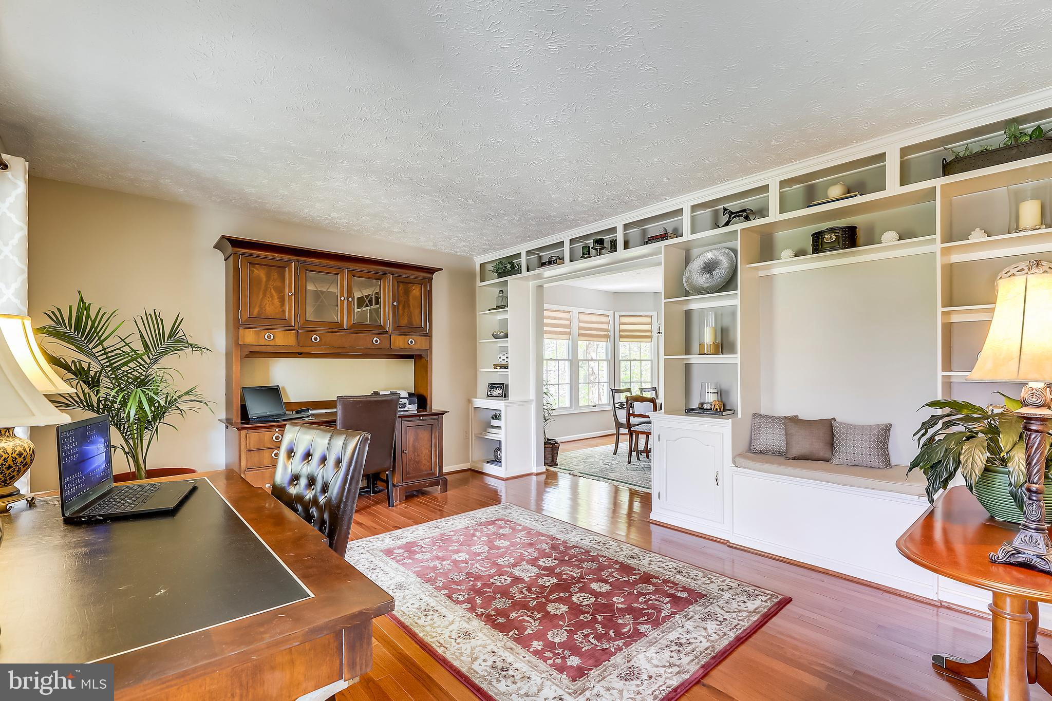Living Rm w/amazing Built-ins is used as an office