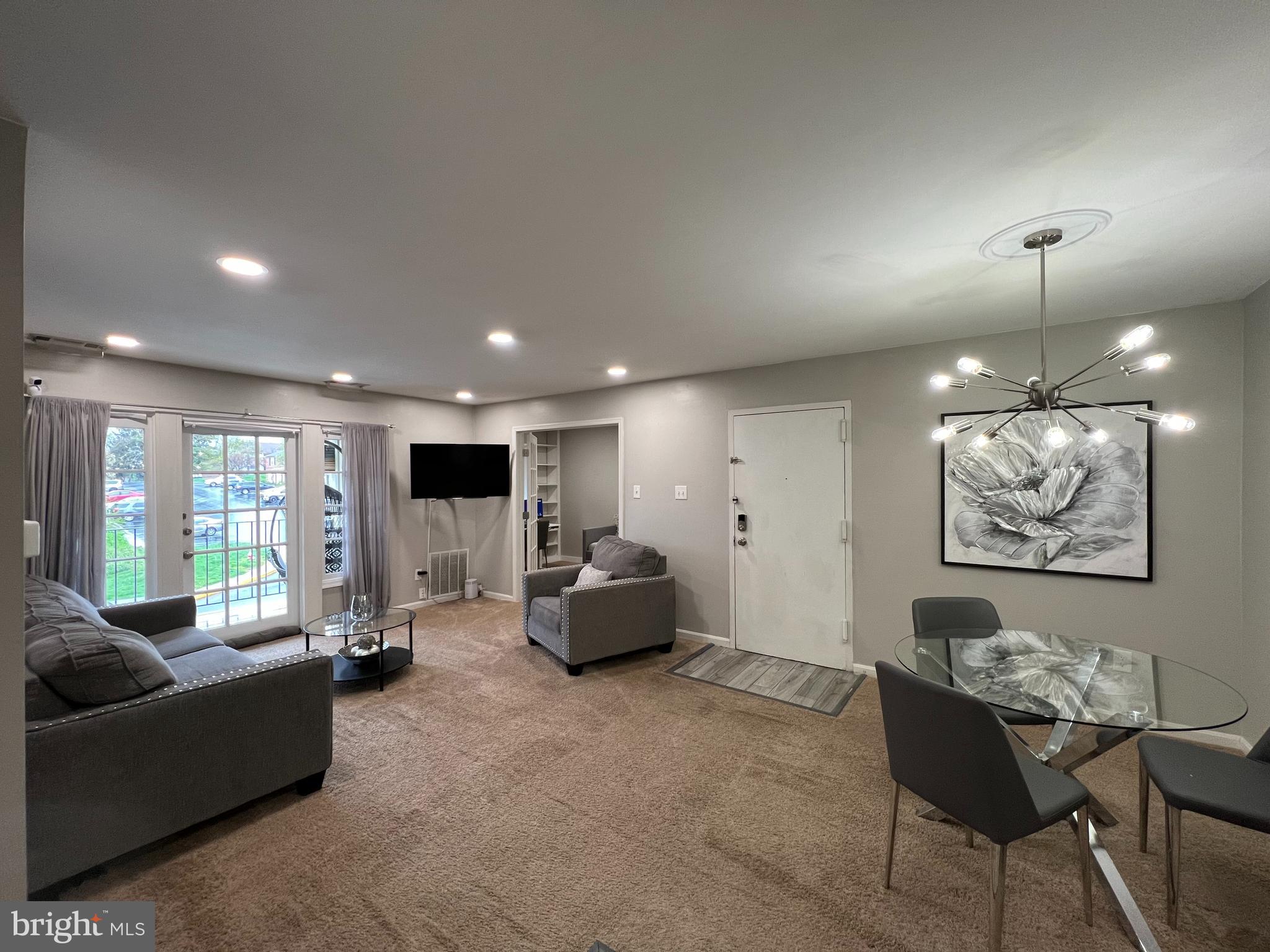 5800 F Torington Drive, Unit 837 Springfield, VA 22152 - Photo 2 of 31 Living Room and Dining Area looking into BR3