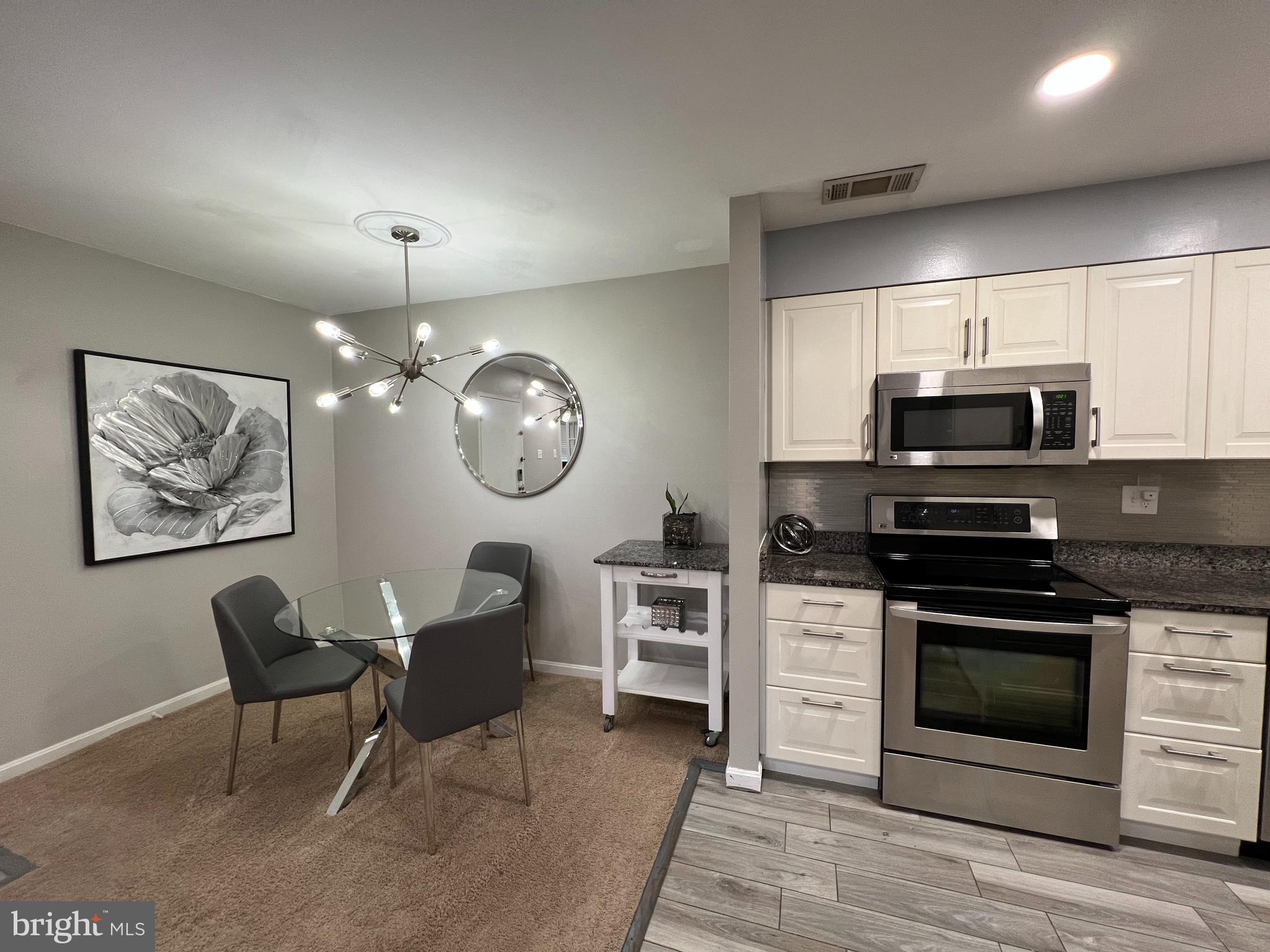 5800 F Torington Drive, Unit 837 Springfield, VA 22152 - Photo 5 of 31 Dining Area opens to kitchen