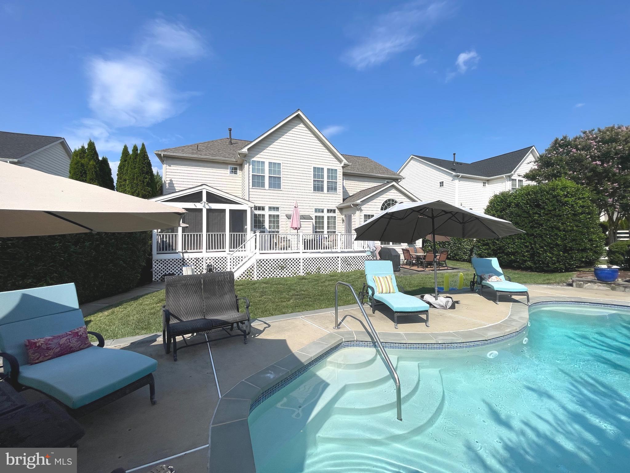 a patio with table and chairs