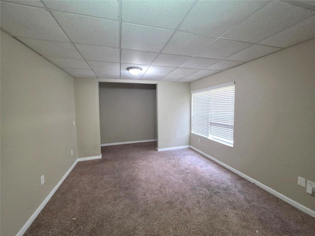 92 Revere Turn Fairburn, GA 30213 - Photo 32 of 42 a view of an empty room with a window
