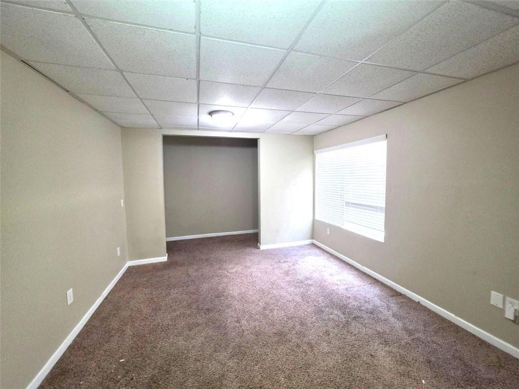 92 Revere Turn Fairburn, GA 30213 - Photo 34 of 42 a view of an empty room with a window