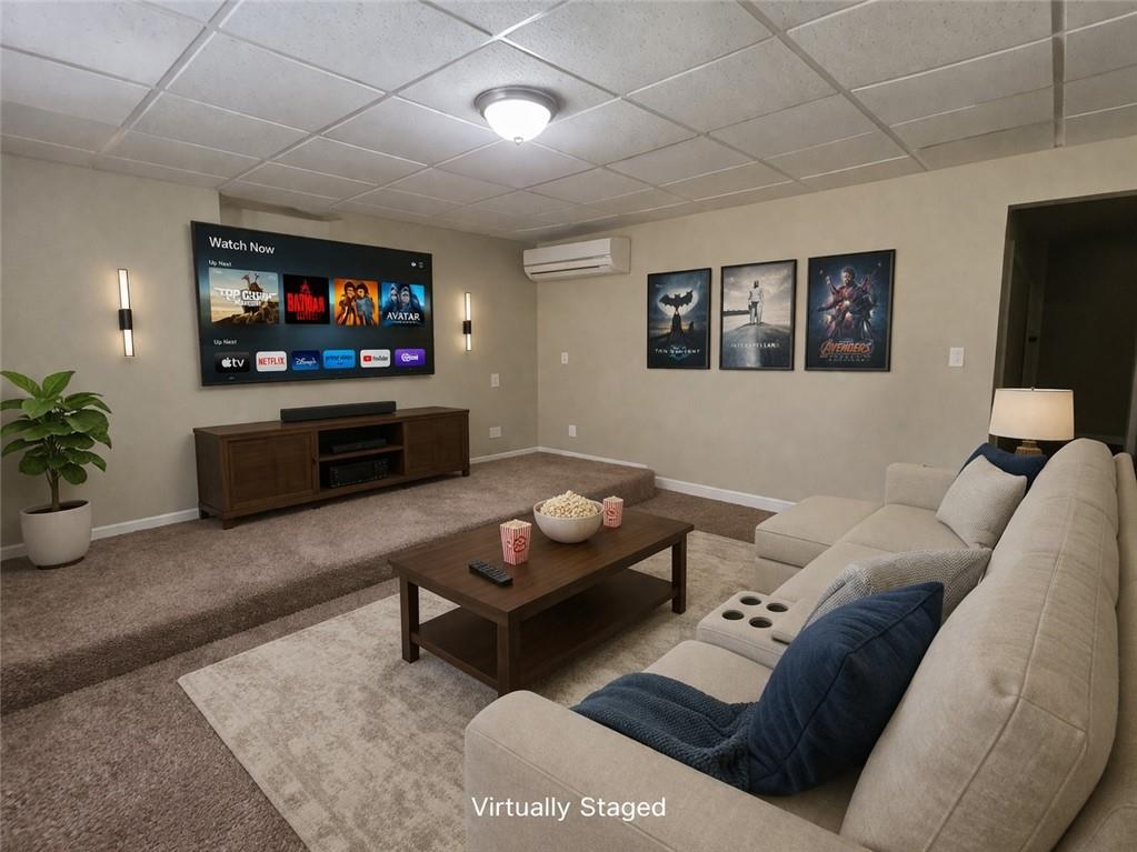 92 Revere Turn Fairburn, GA 30213 - Photo 36 of 42 a living room with furniture and a flat screen tv