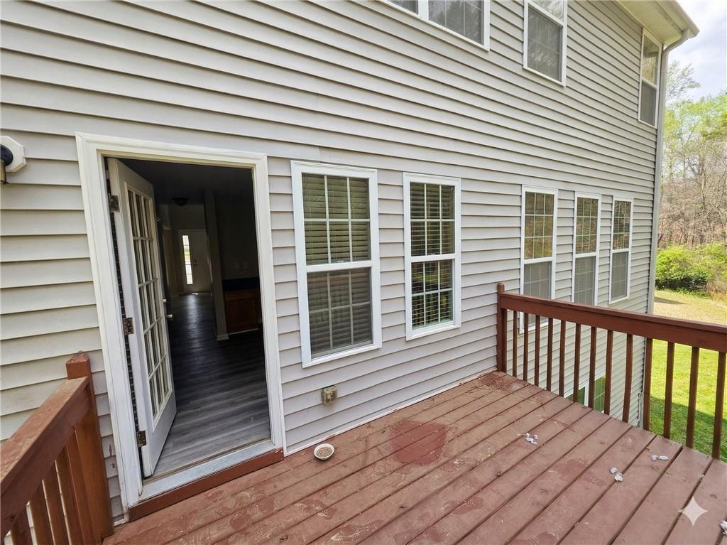 92 Revere Turn Fairburn, GA 30213 - Photo 41 of 42 a view of a wooden deck