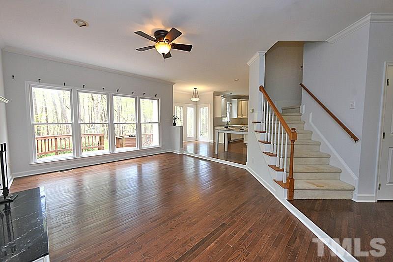 12317 Glenlivet Way Raleigh, NC 27613 - Photo 11 of 25 a view of an entryway with wooden floor