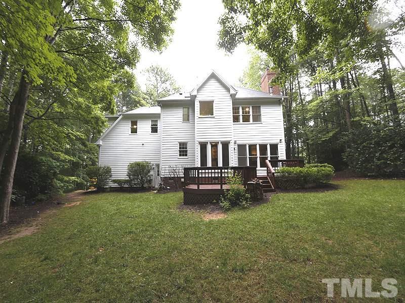 12317 Glenlivet Way Raleigh, NC 27613 - Photo 23 of 25 a view of a house with a yard and sitting area