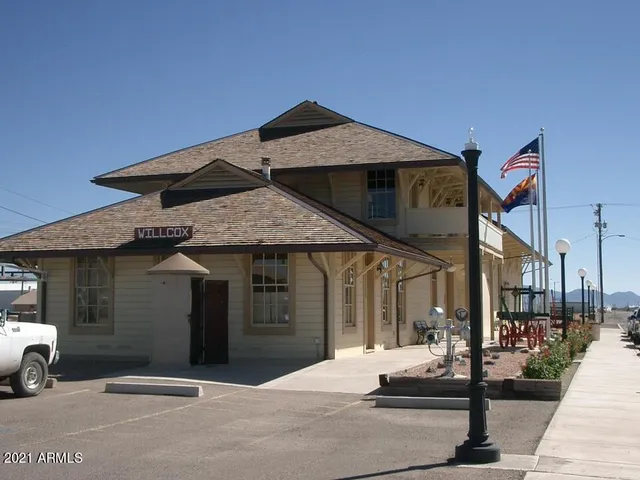 a view of a car parked in front of building