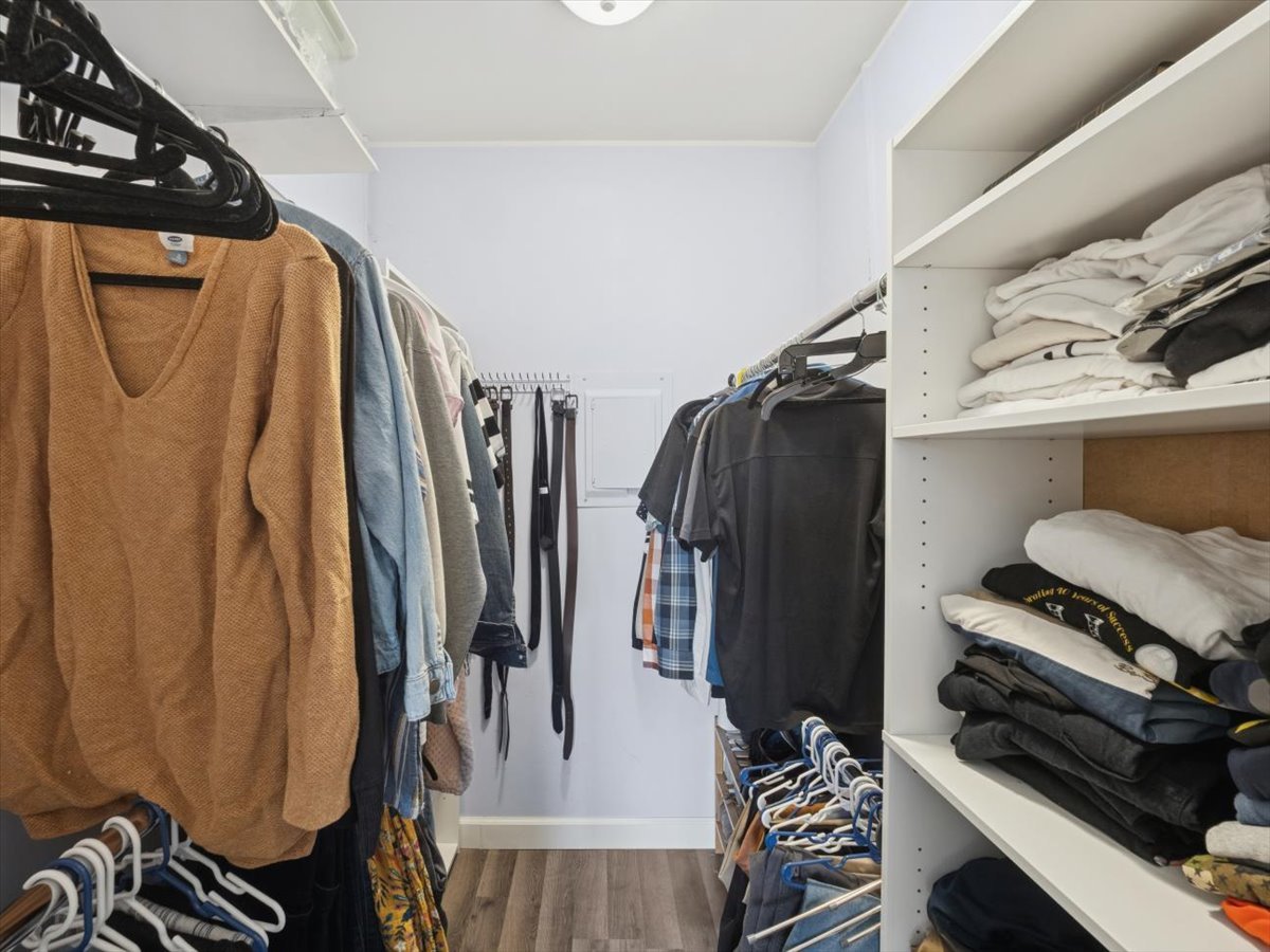 1220 Fulton Drive Streamwood, IL 60107 - Photo 12 of 18 a view of walk in closet with clothes and shoes