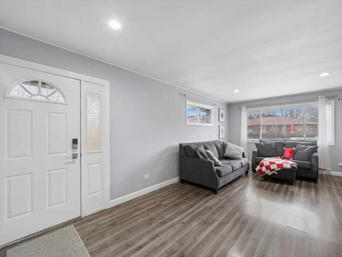 1220 Fulton Drive Streamwood, IL 60107 - Photo 5 of 18 a living room with furniture and wooden floor