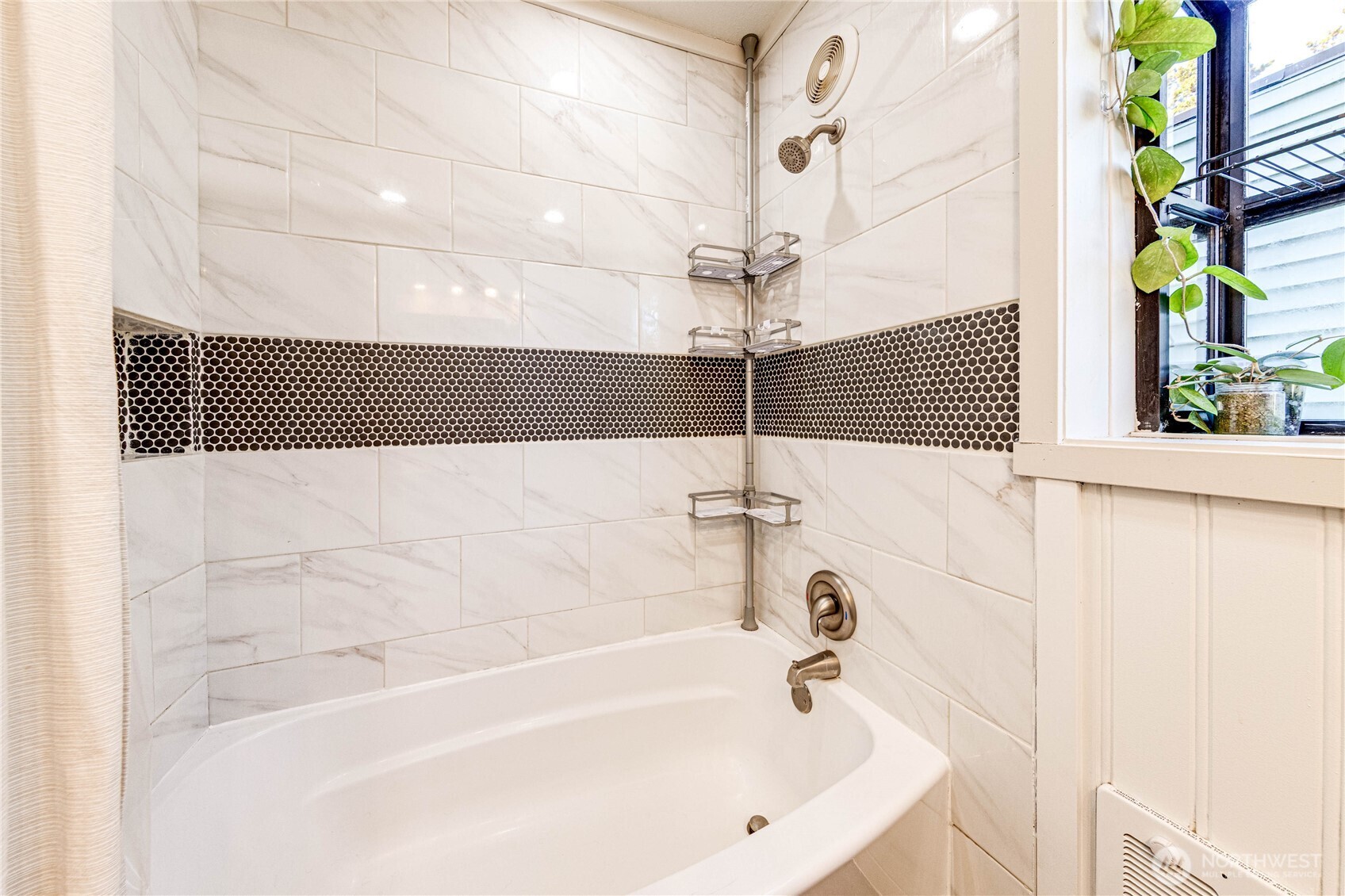 231 West 4th Street Port Angeles, WA 98362 - Photo 25 of 40 a bathroom with a bathtub and a shower