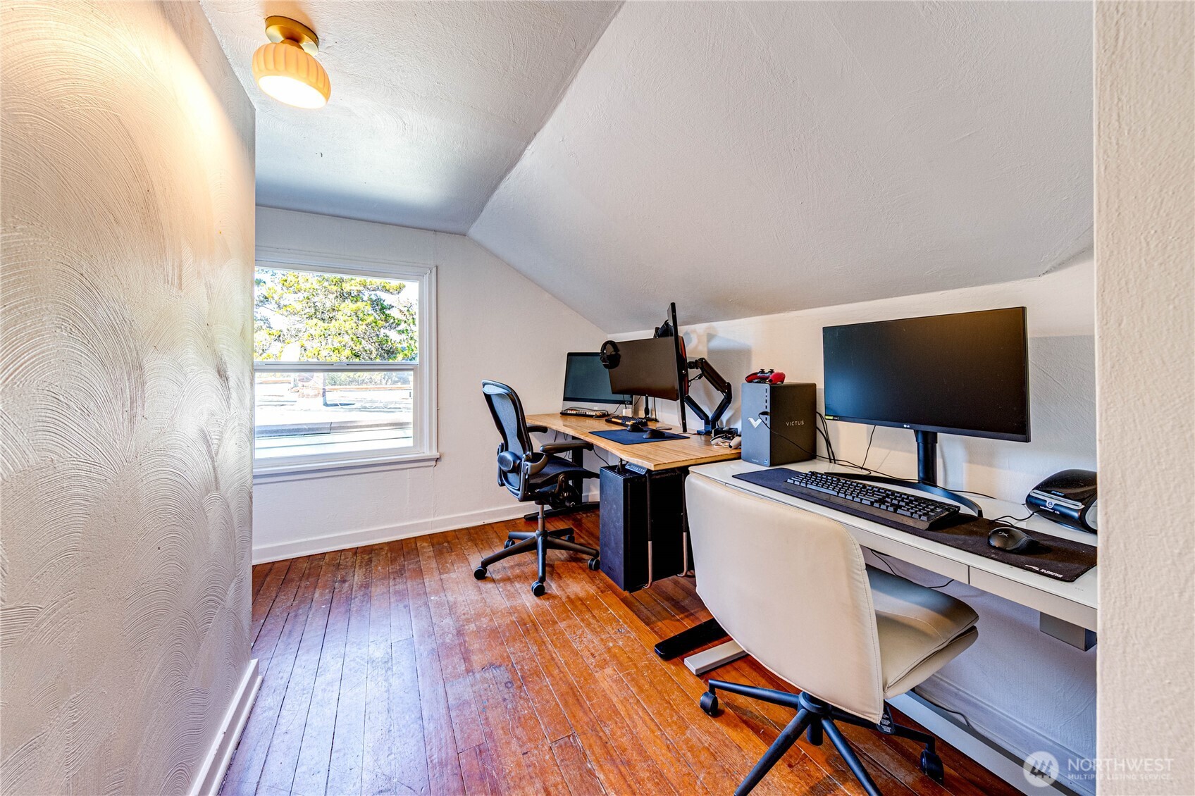 231 West 4th Street Port Angeles, WA 98362 - Photo 29 of 40 a view of a workspace with furniture and a window