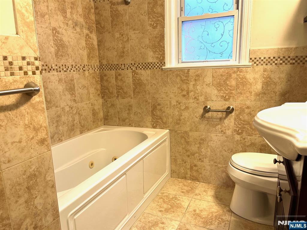 162 Union Place Ridgefield Park, NJ 07660 - Photo 18 of 21 a bathroom with a sink and a toilet