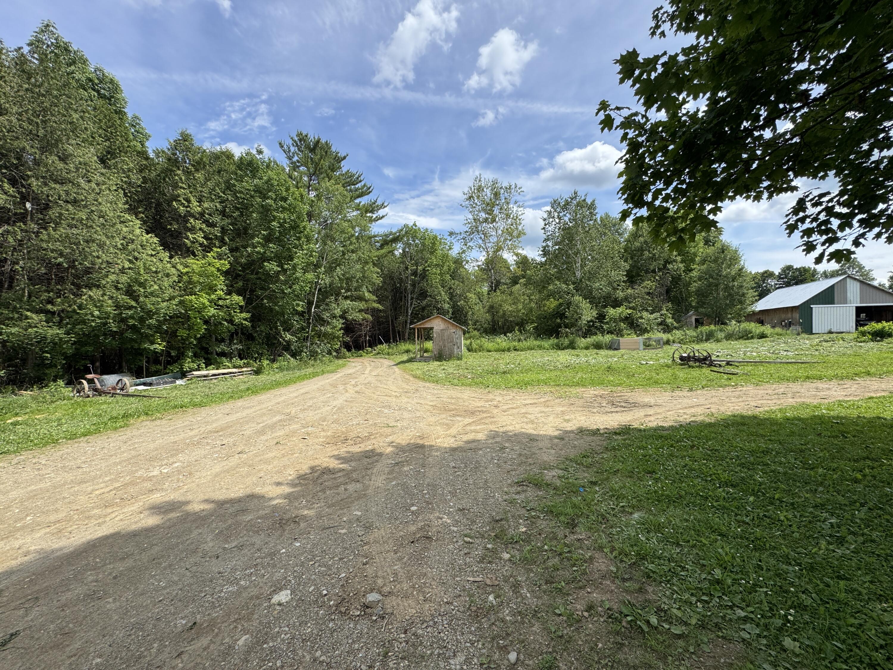 1698 Exeter Road Exeter, ME 04435 - Photo 32 of 42 Barn on Right