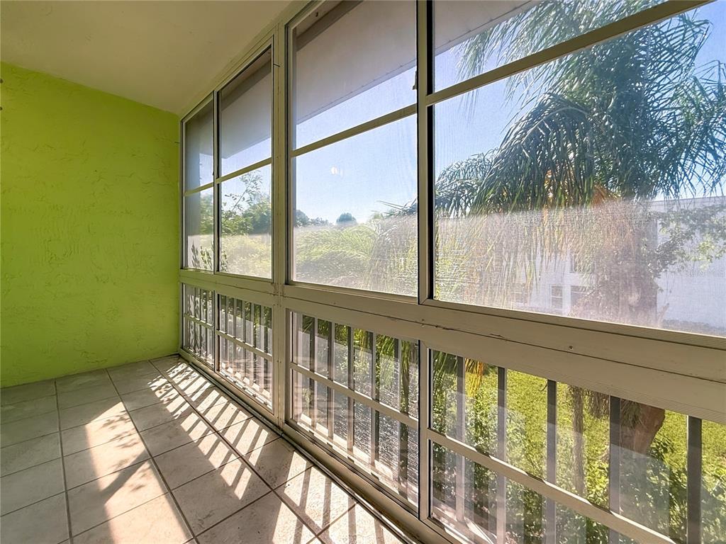 379 South McMullen Booth Road, Unit 76 Clearwater, FL 33759 - Photo 29 of 39 a view of a large window with an outdoor space