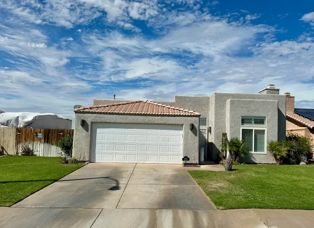a front view of house with yard