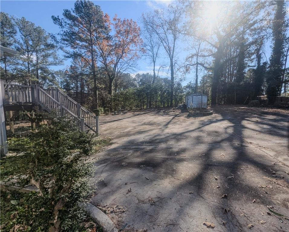 4628 Tucson Trail Southwest Atlanta, GA 30331 - Photo 14 of 29 a view of a yard with trees