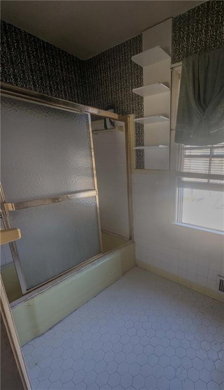 4628 Tucson Trail Southwest Atlanta, GA 30331 - Photo 17 of 29 a view of storage and utility room with racks on the wall