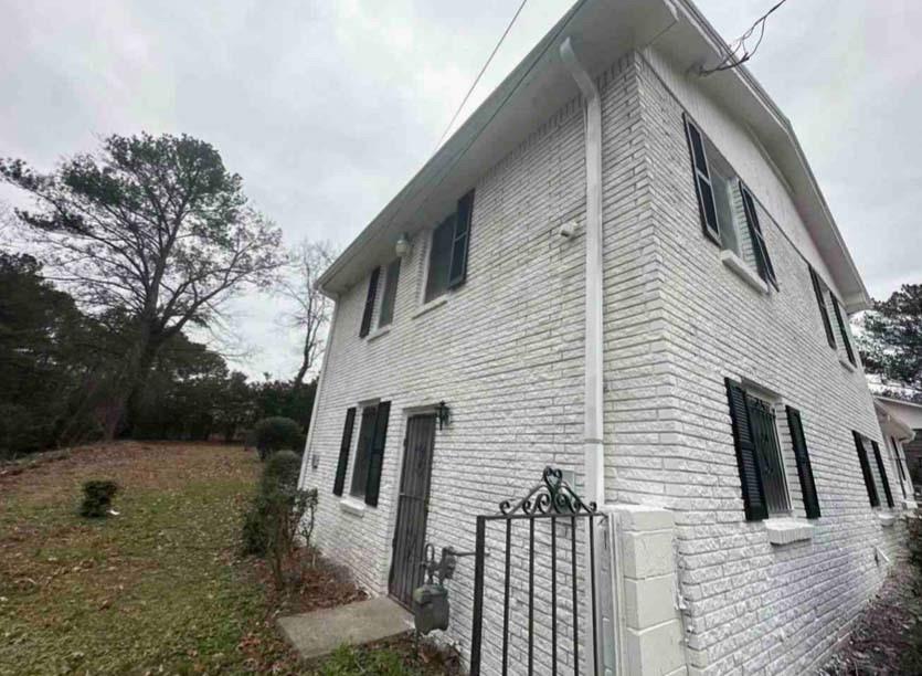 4628 Tucson Trail Southwest Atlanta, GA 30331 - Photo 27 of 29 a view of a house with a yard