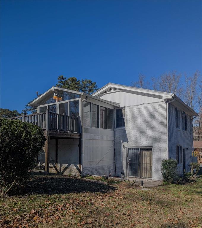 4628 Tucson Trail Southwest Atlanta, GA 30331 - Photo 4 of 29 a front view of a house with a yard