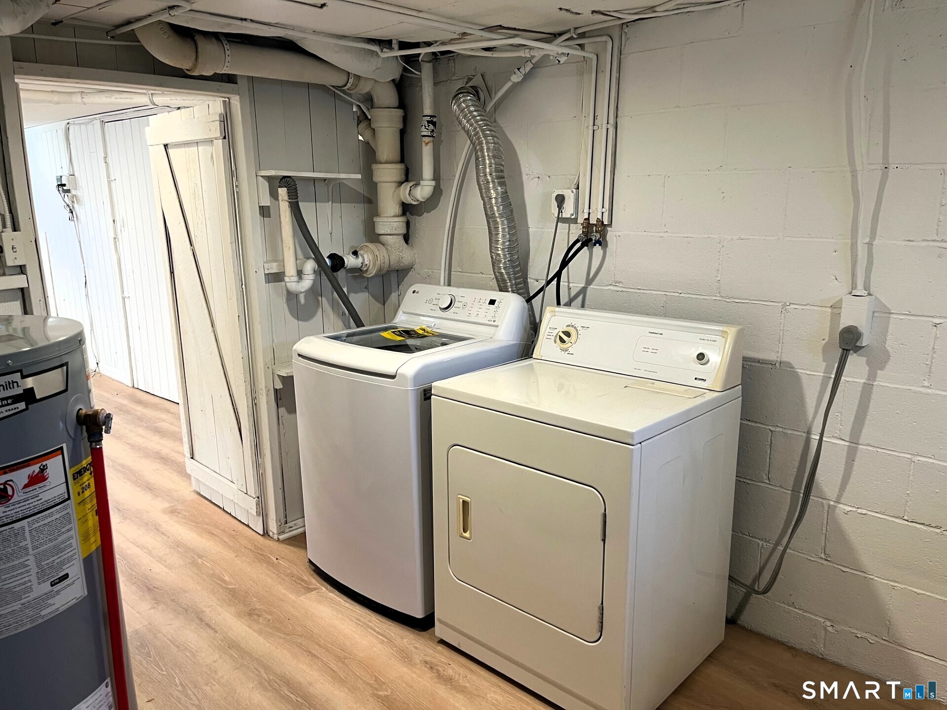 98 Wooster Street Bethel, CT 06801 - Photo 14 of 17 a utility room with dryer and washer