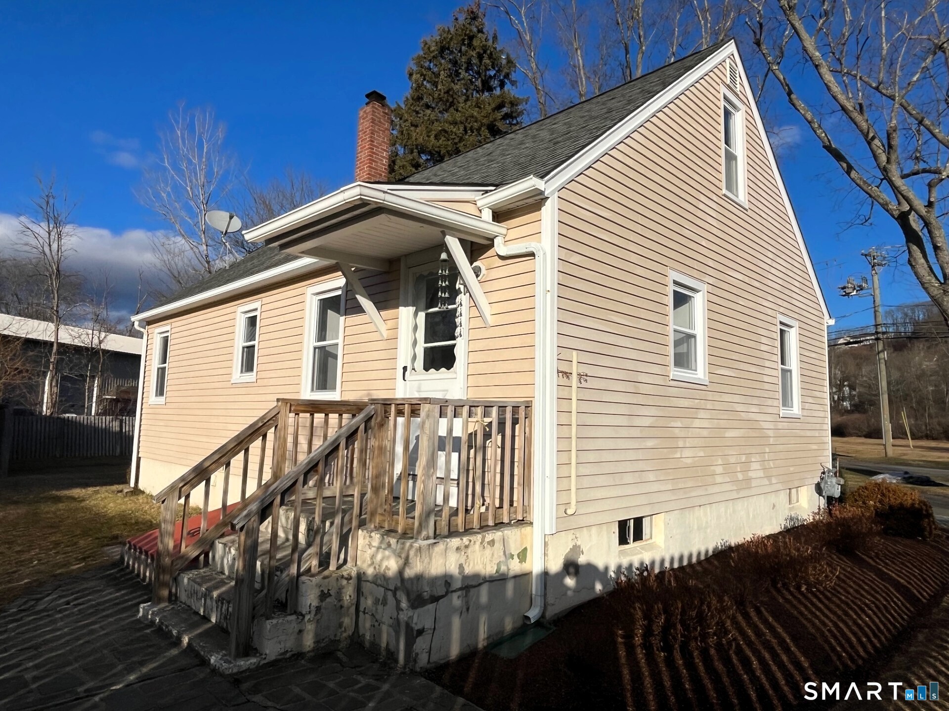 98 Wooster Street Bethel, CT 06801 - Photo 16 of 17 a view of a house with a roof deck
