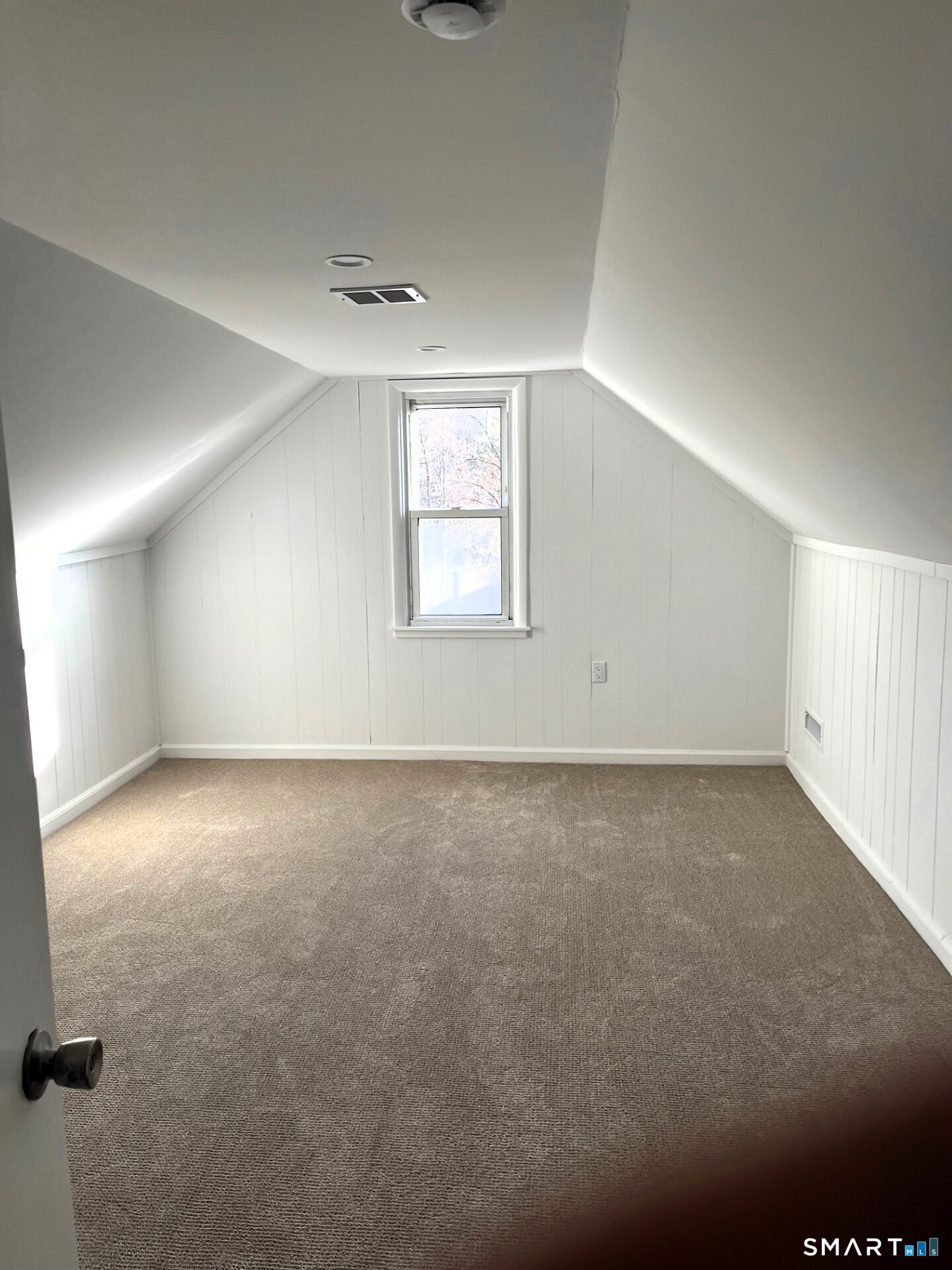 98 Wooster Street Bethel, CT 06801 - Photo 10 of 17 an empty room with a empty space and windows