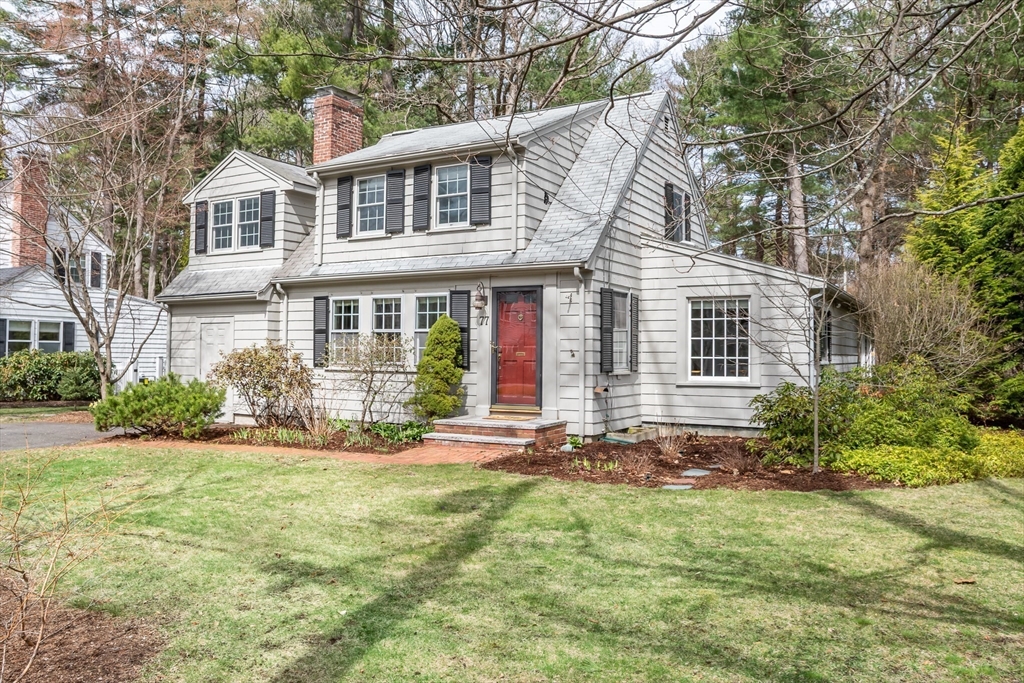 77 Parker Road Wellesley, MA 02482 - Photo 3 of 19 a front view of a house with a yard and fountain
