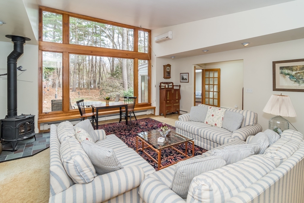 77 Parker Road Wellesley, MA 02482 - Photo 6 of 19 a living room with furniture and a large window