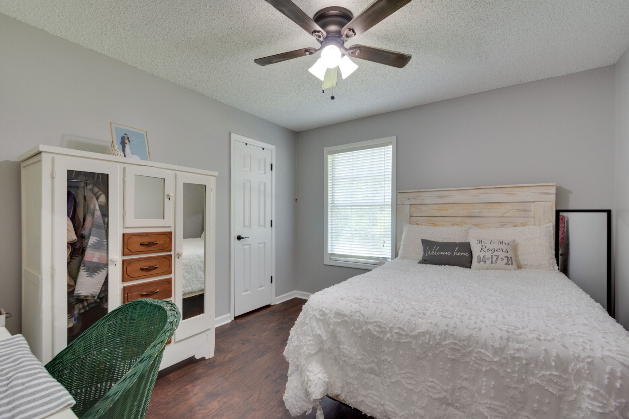 1345 Shores Road Goodspring, TN 38460 - Photo 12 of 21 a bedroom with a large bed and a chandelier