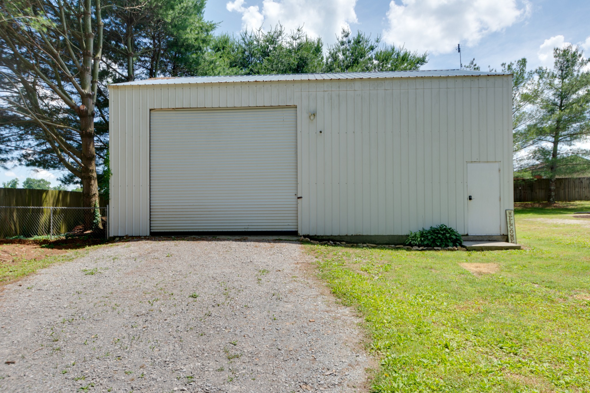 1345 Shores Road Goodspring, TN 38460 - Photo 19 of 21 a backyard of a house with lots of green space
