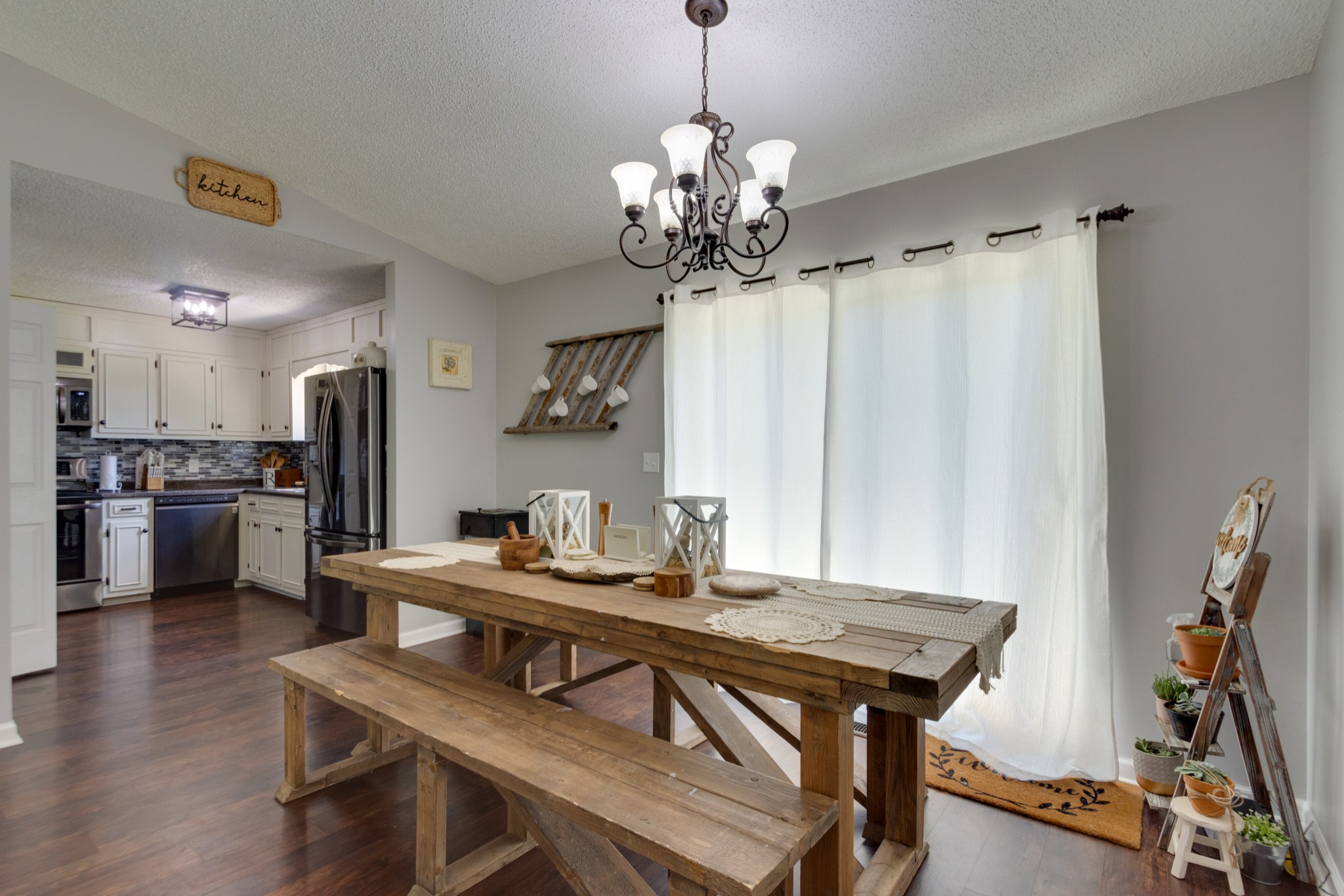 1345 Shores Road Goodspring, TN 38460 - Photo 6 of 21 a view of a dining room with furniture window and wooden floor