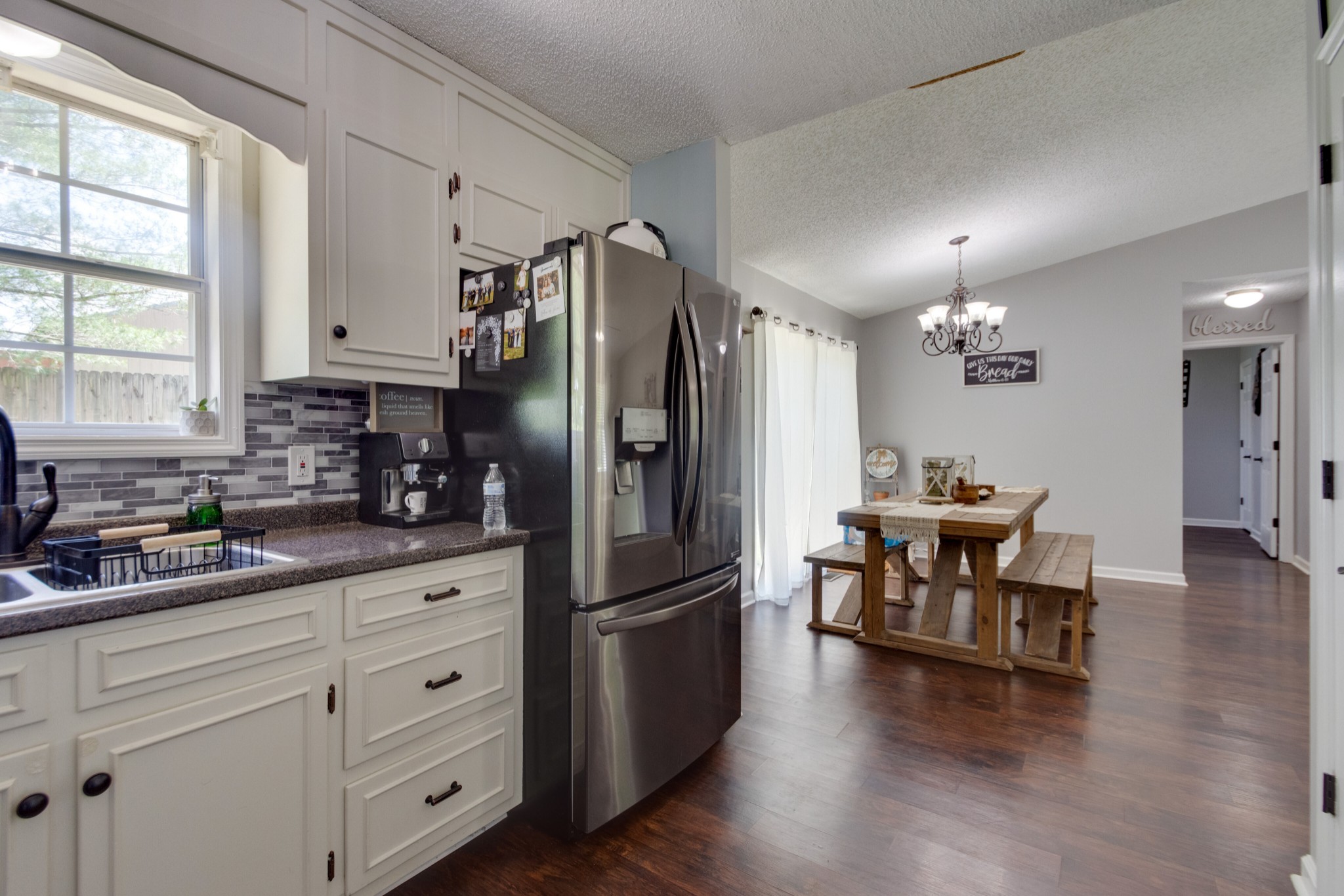 1345 Shores Road Goodspring, TN 38460 - Photo 8 of 21 a kitchen with granite countertop appliances cabinets and a table