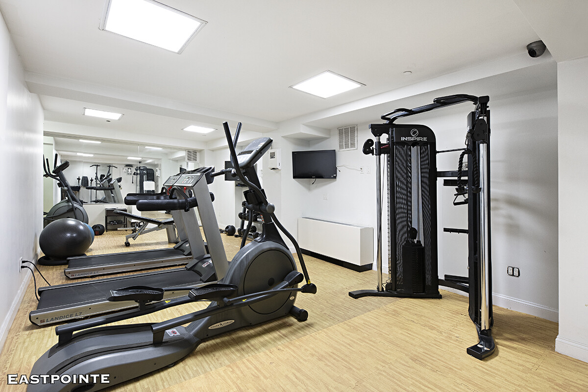 189 Avenue C, Unit 10D Manhattan, NY 10009 - Photo 5 of 10 a view of a room with gym equipment