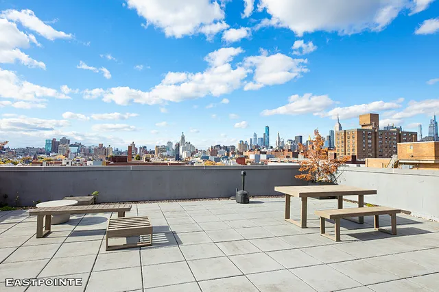 a view of a terrace with chairs