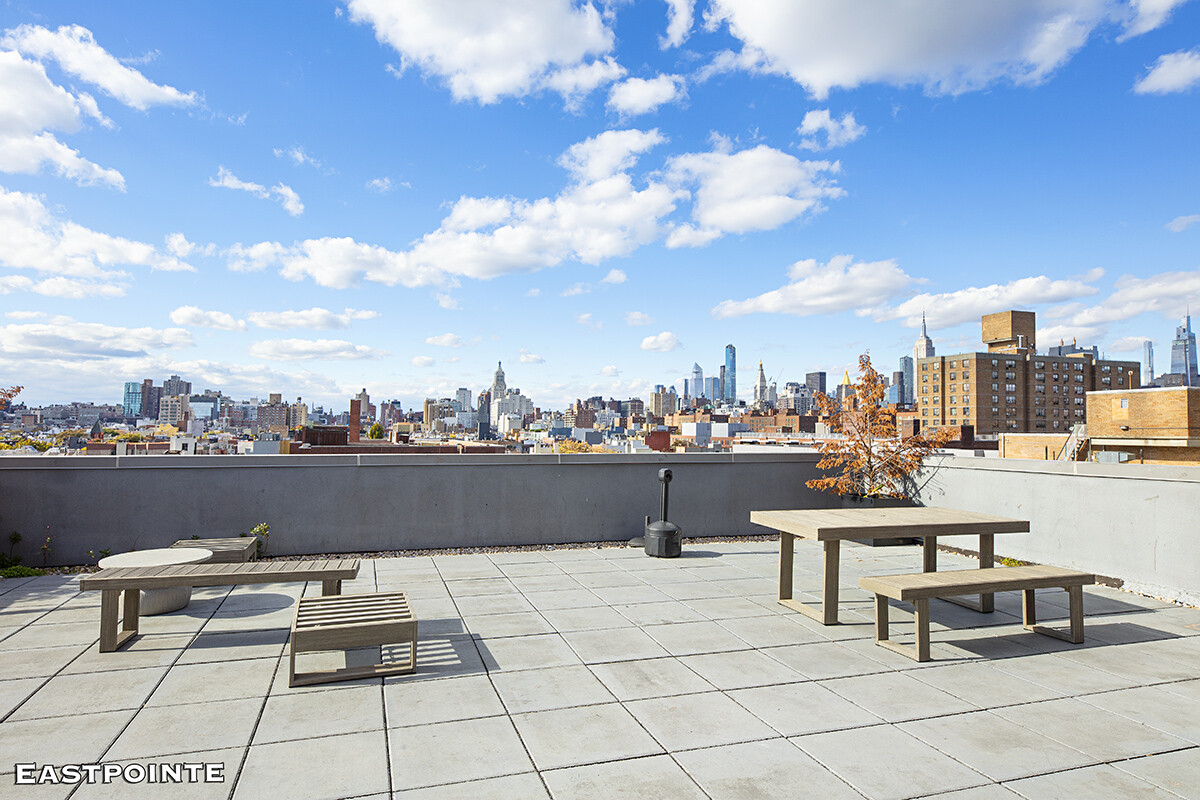 189 Avenue C, Unit 10D Manhattan, NY 10009 - Photo 6 of 10 a view of a terrace with chairs