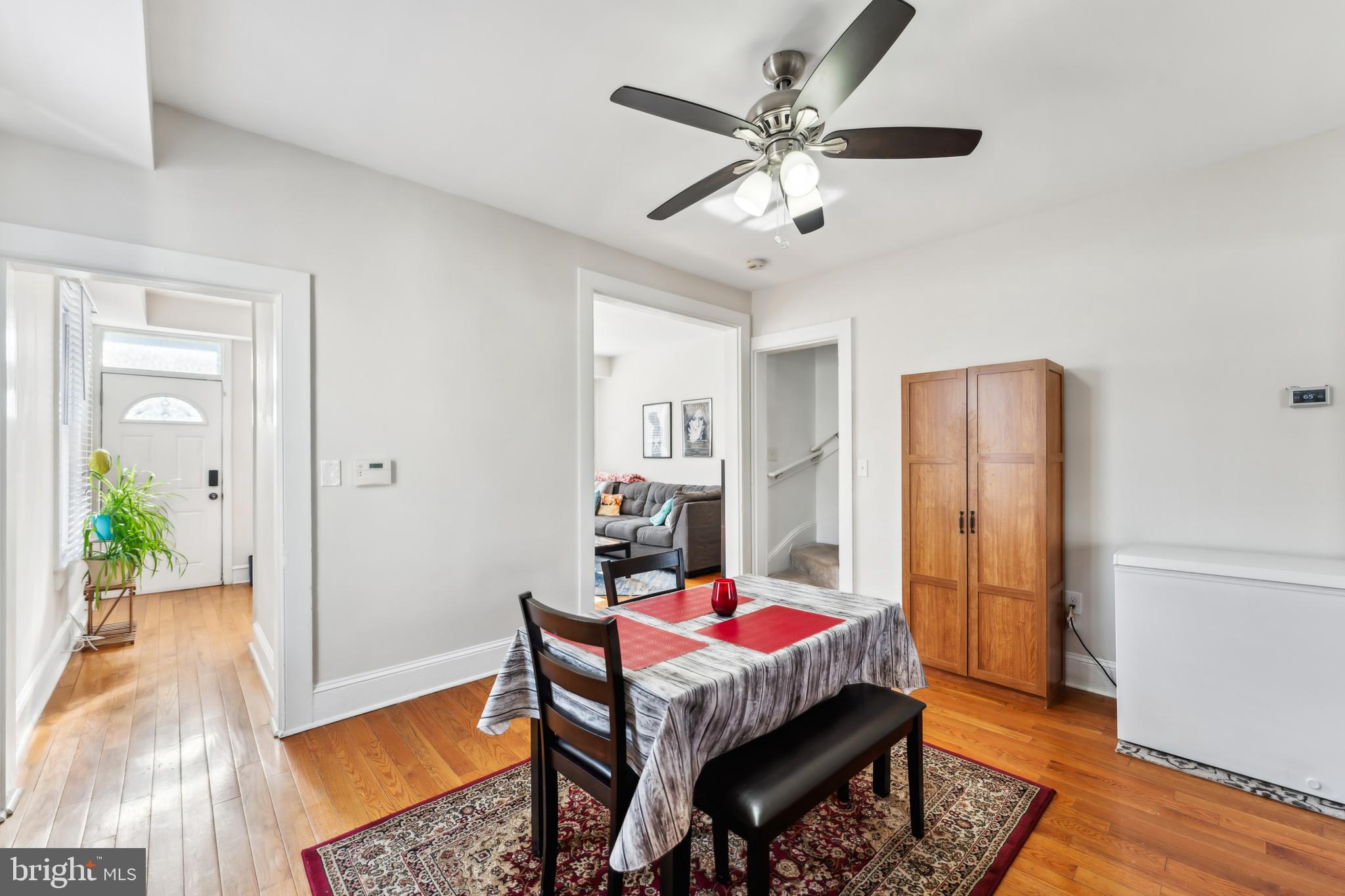 9 Carroll Street Westminster, MD 21157 - Photo 11 of 30 a living room with furniture and a chandelier