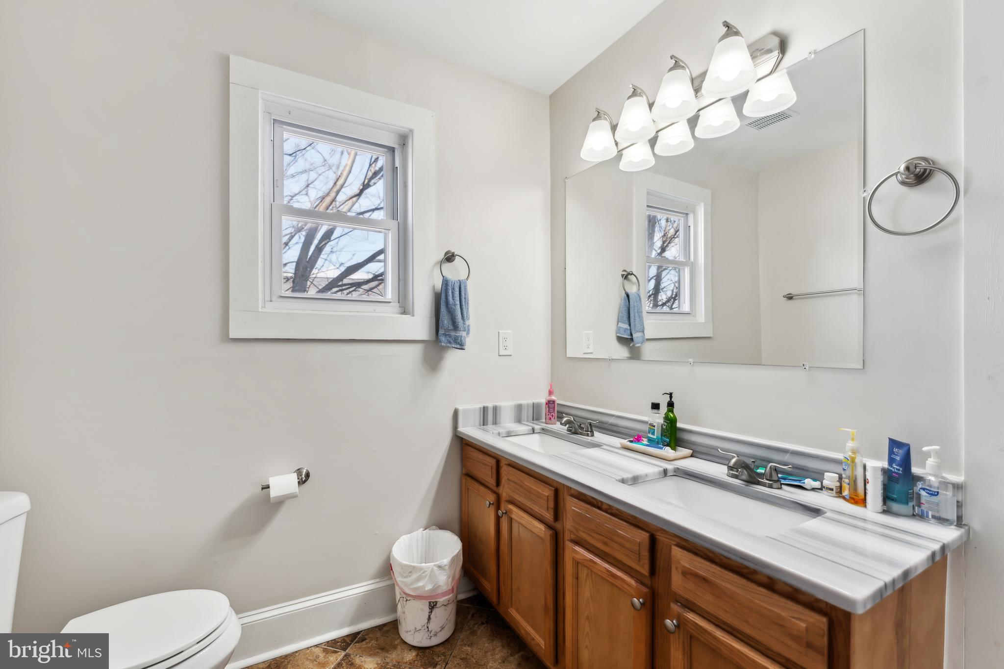 9 Carroll Street Westminster, MD 21157 - Photo 14 of 30 a bathroom with a sink vanity granite and toilet