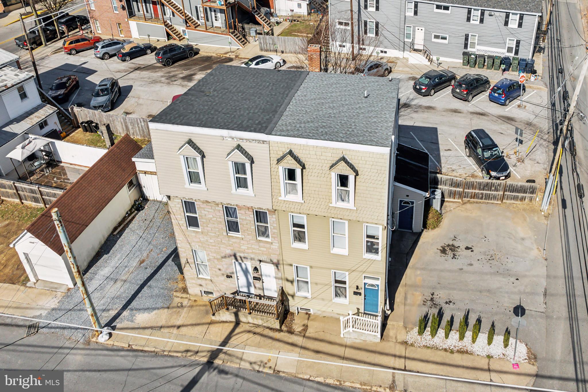 9 Carroll Street Westminster, MD 21157 - Photo 2 of 30 front view of a building with many windows