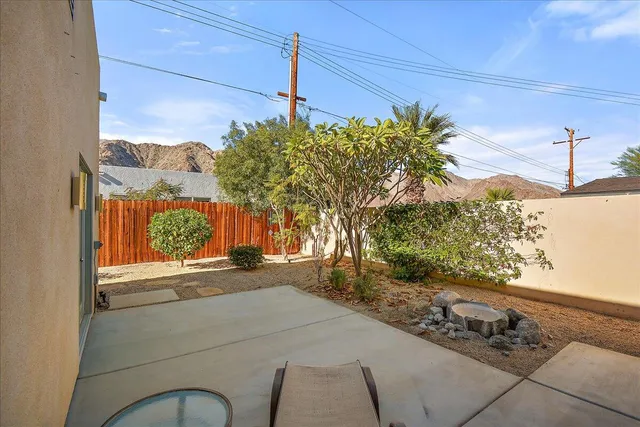 a view of a house with a street