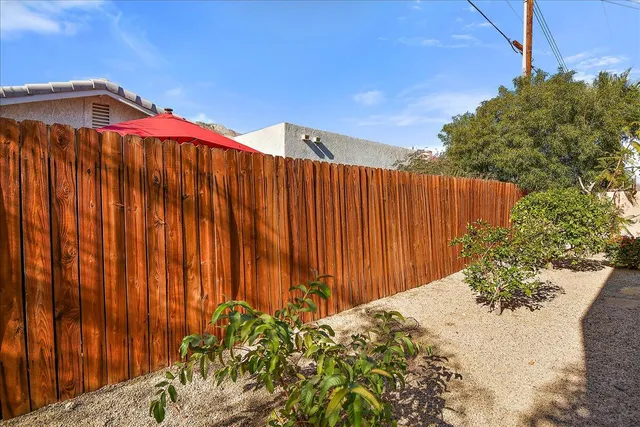 a view of a wooden fence