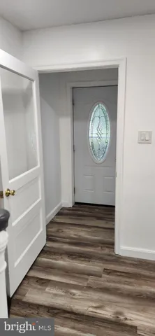 a view of a house with a street