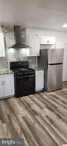 a view of swimming pool with a yard